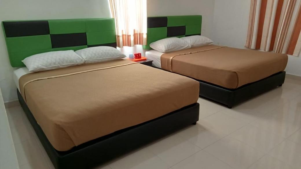 Dlayaran Villa Guest House กัวลา รอมปิน ภายนอก รูปภาพ