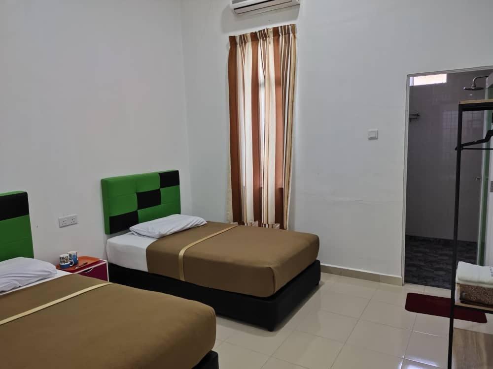 Dlayaran Villa Guest House กัวลา รอมปิน ภายนอก รูปภาพ